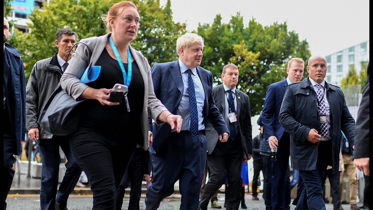 Image ©Licensed to i-Images Picture Agency. 29/09/2019. Manchester , United Kingdom. Conservative Party Conference- Day One. The Prime Minister Boris Johnson walking back to the  Conservative Party Conference Hotel in Manchester  day one of the Conservative Party Conference Picture by Andrew Parsons / i-Images